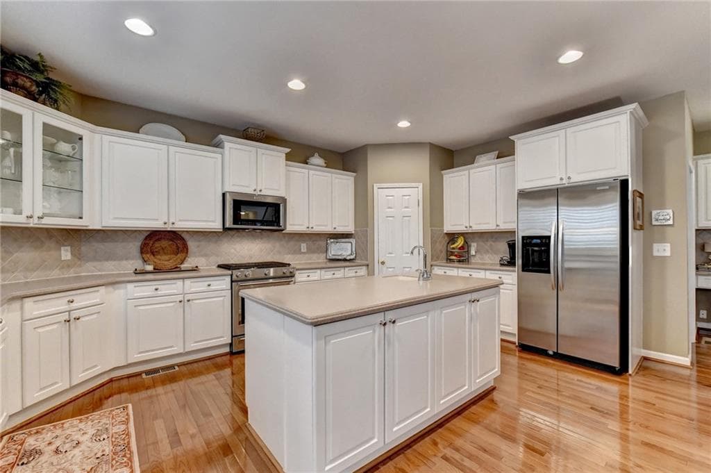 5 bedroom, 3 bathroom, 3,525 sq ft single family residence for sale at 4196 Cami Way, Buford, GA 30519 — photo 2
