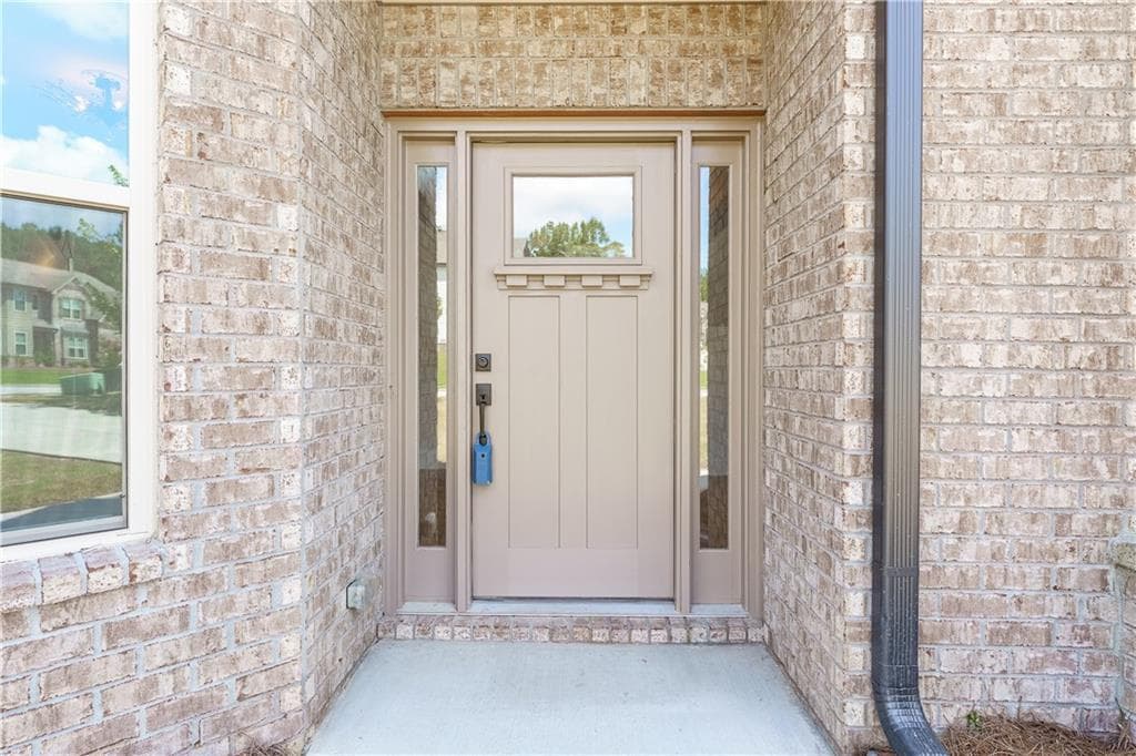 5 bedroom, 3 bathroom, 3,150 sq ft single family residence for sale at 1180 Brading Place, Lawrenceville, GA 30043 — photo 4