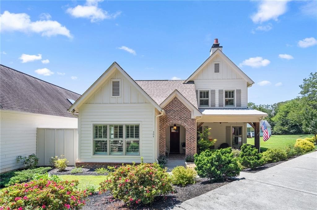 4 bedroom, 5 bathroom, 3,609 sq ft single family residence for sale at 304 Woodstock Seven Drive, Woodstock, GA 30188 — photo 2