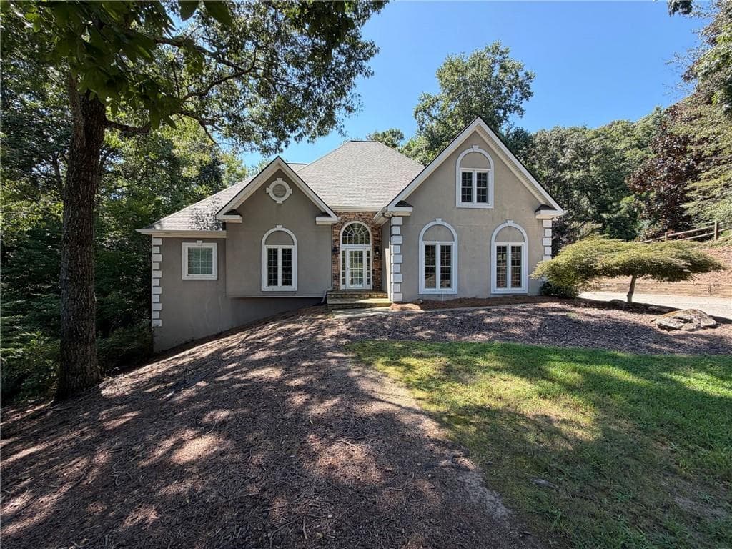 6 bedroom, 4 bathroom, 4,712 sq ft single family residence for sale at 3320 Sweetwater Drive, Cumming, GA 30041 — photo 1 of 55