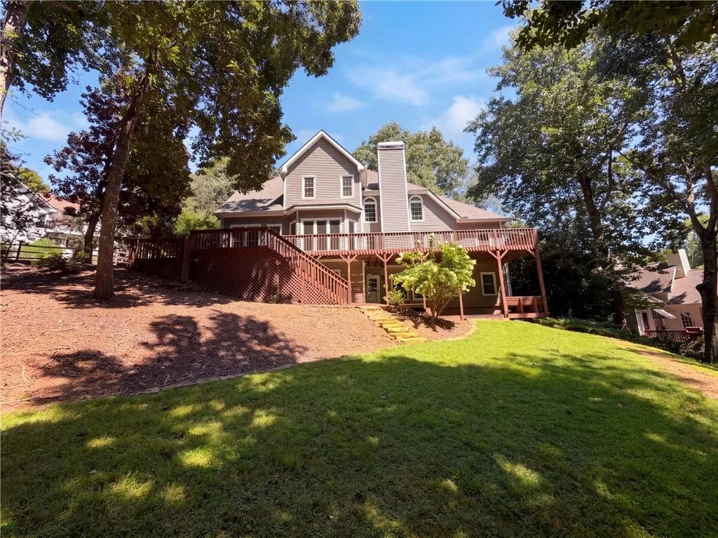 6 bedroom, 4 bathroom, 4,712 sq ft single family residence for sale at 3320 Sweetwater Drive, Cumming, GA 30041 — photo 5