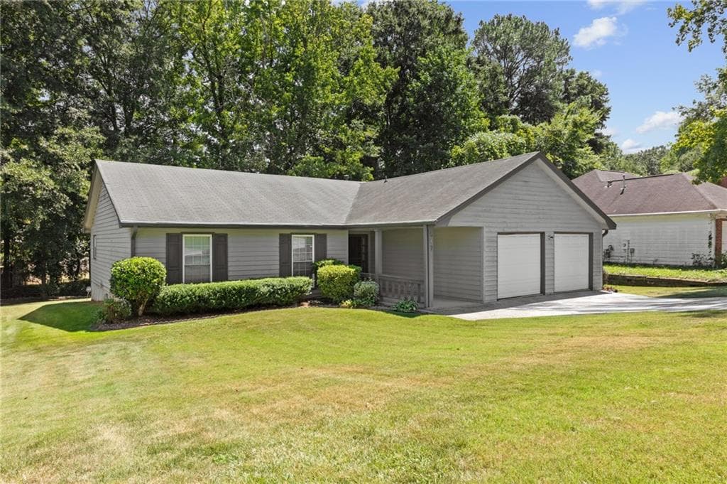 3 bedroom, 2 bathroom, 1,802 sq ft single family residence for sale at 607 Stonemill Manor, Lithonia, GA 30058 — photo 2