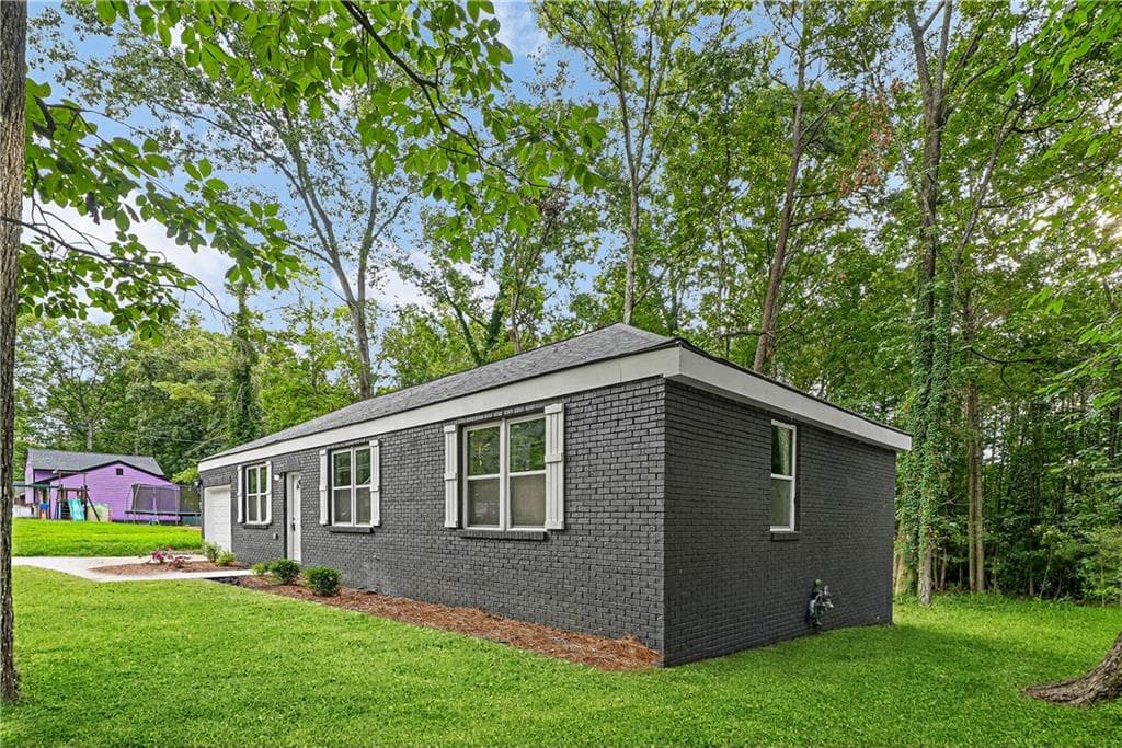 3 bedroom, 2 bathroom, 1,398 sq ft single family residence for sale at 5376 Denny Drive, Atlanta, GA 30349 — photo 2