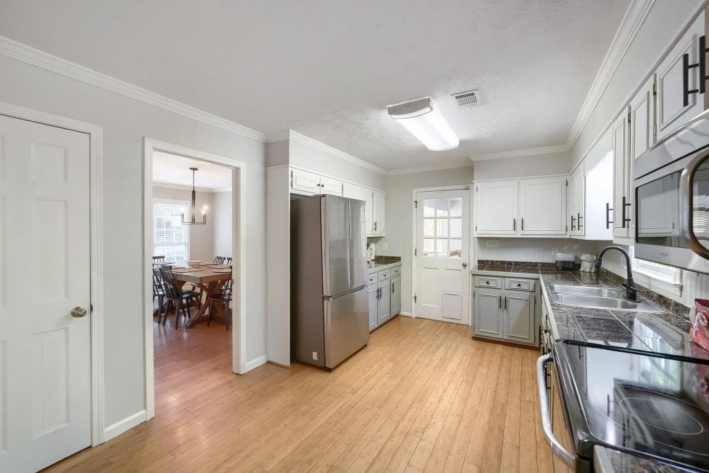4 bedroom, 3 bathroom, 2,162 sq ft single family residence for sale at 788 Flowers Crossing, Lawrenceville, GA 30044 — photo 10