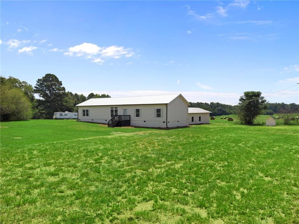 4 bedroom, 2 bathroom, 2,432 sq ft single family residence for sale at 1300 Credille Pond Road, Greensboro, GA 30642 — photo 2