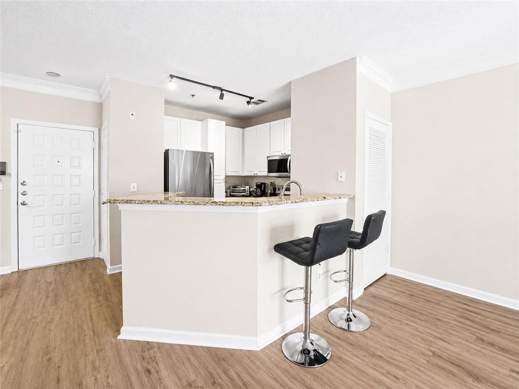 1 bedroom, 1 bathroom, 871 sq ft condominium for sale at 10 Perimeter Summit Boulevard 4409, Brookhaven, GA 30319 — photo 4