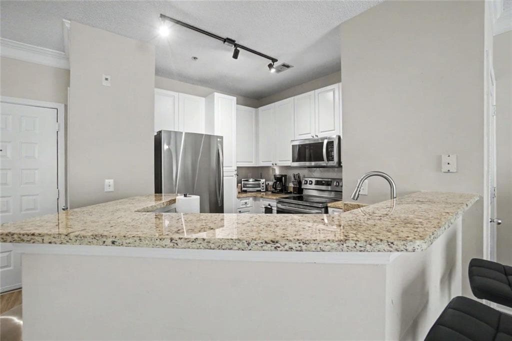 1 bedroom, 1 bathroom, 871 sq ft condominium for sale at 10 Perimeter Summit Boulevard 4409, Brookhaven, GA 30319 — photo 5