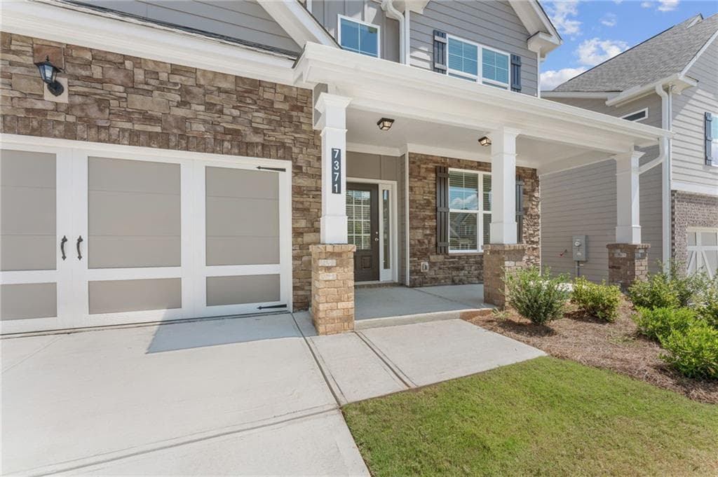 4 bedroom, 3 bathroom, 2,626 sq ft single family residence for sale at 7371 Rocklin Lane, Flowery Branch, GA 30542 — photo 2