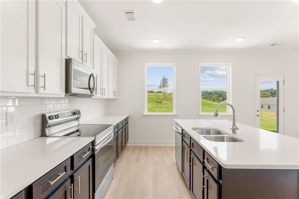 4 bedroom, 3 bathroom, 2,626 sq ft single family residence for sale at 7371 Rocklin Lane, Flowery Branch, GA 30542 — photo 9