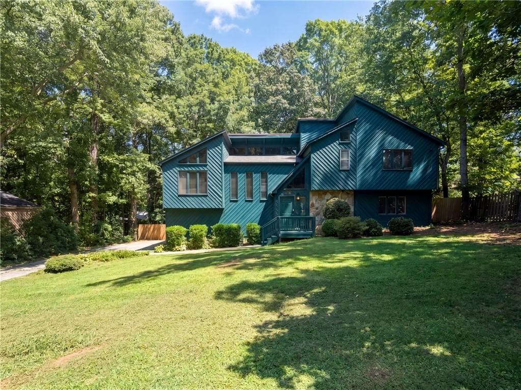 4 bedroom, 3 bathroom, 2,242 sq ft single family residence for sale at 3409 Woodrun Trail, Marietta, GA 30062 — photo 1 of 30