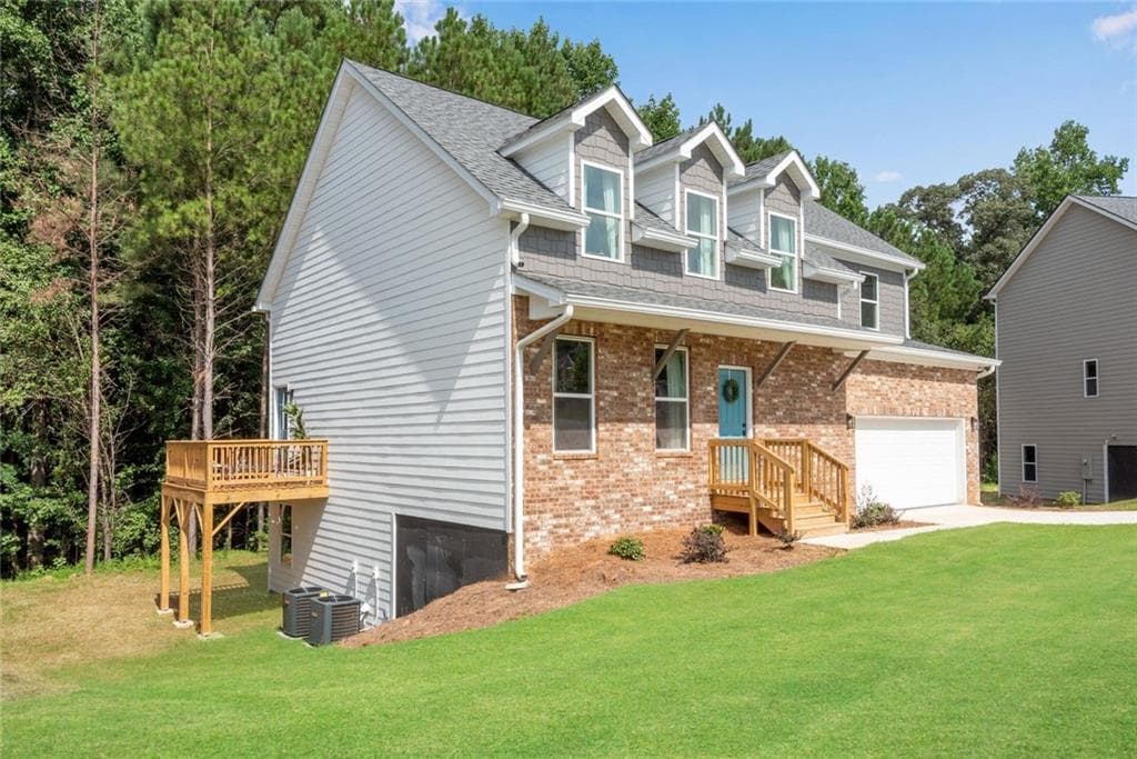 4 bedroom, 3 bathroom, 2,884 sq ft single family residence for sale at 3408 Ashford Loop, Ellenwood, GA 30294 — photo 2