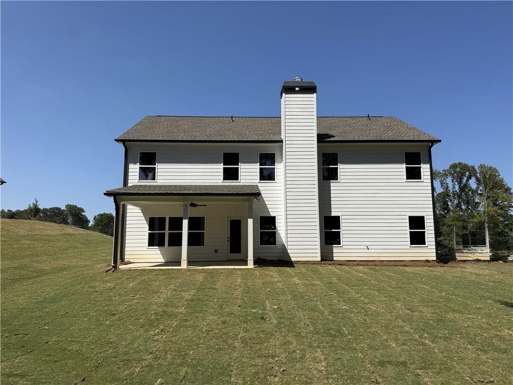 4 bedroom, 3 bathroom, 2,660 sq ft single family residence for sale at 115 FAIRWINDS Drive, Covington, GA 30016 — photo 2