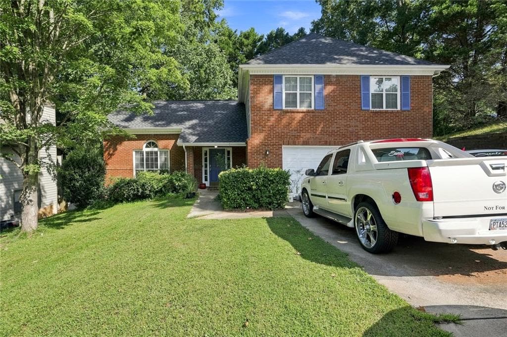 3 bedroom, 3 bathroom, 1,966 sq ft single family residence for sale at 1301 Sweet Woods Drive, Lawrenceville, GA 30044 — photo 1 of 25