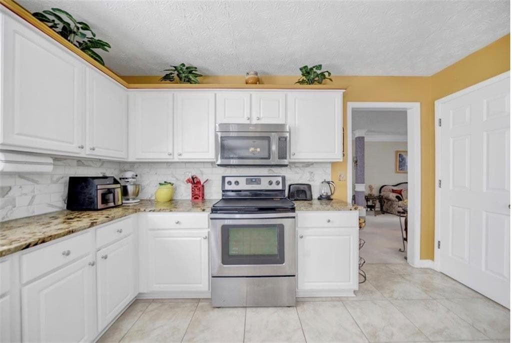 5 bedroom, 3 bathroom, 3,436 sq ft single family residence for sale at 3202 Kittery Drive, Snellville, GA 30039 — photo 7
