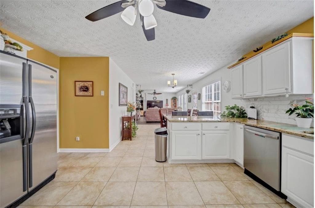5 bedroom, 3 bathroom, 3,436 sq ft single family residence for sale at 3202 Kittery Drive, Snellville, GA 30039 — photo 8