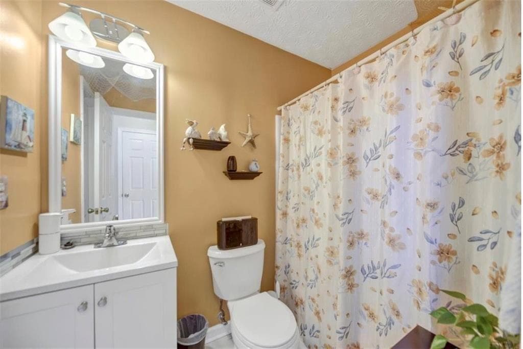 5 bedroom, 3 bathroom, 3,436 sq ft single family residence for sale at 3202 Kittery Drive, Snellville, GA 30039 — photo 9