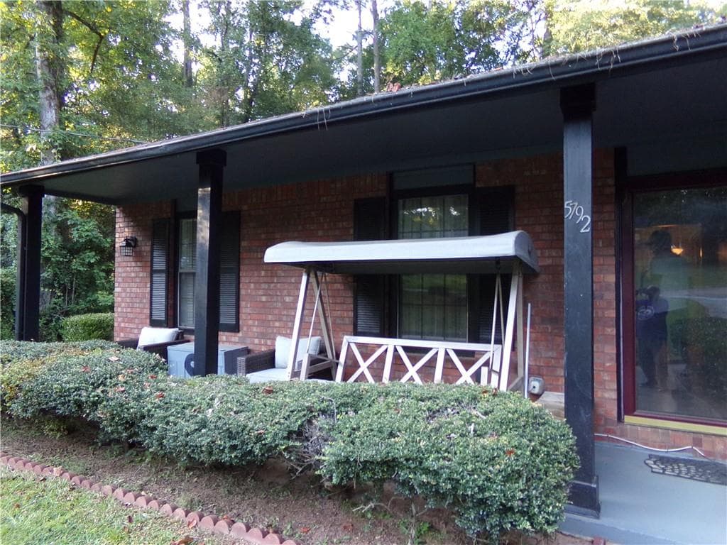 4 bedroom, 2 bathroom, 1,857 sq ft single family residence for sale at 5792 Windermere Court, Lithonia, GA 30038 — photo 3