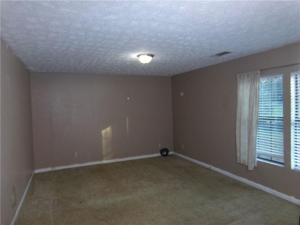 4 bedroom, 2 bathroom, 1,857 sq ft single family residence for sale at 5792 Windermere Court, Lithonia, GA 30038 — photo 9