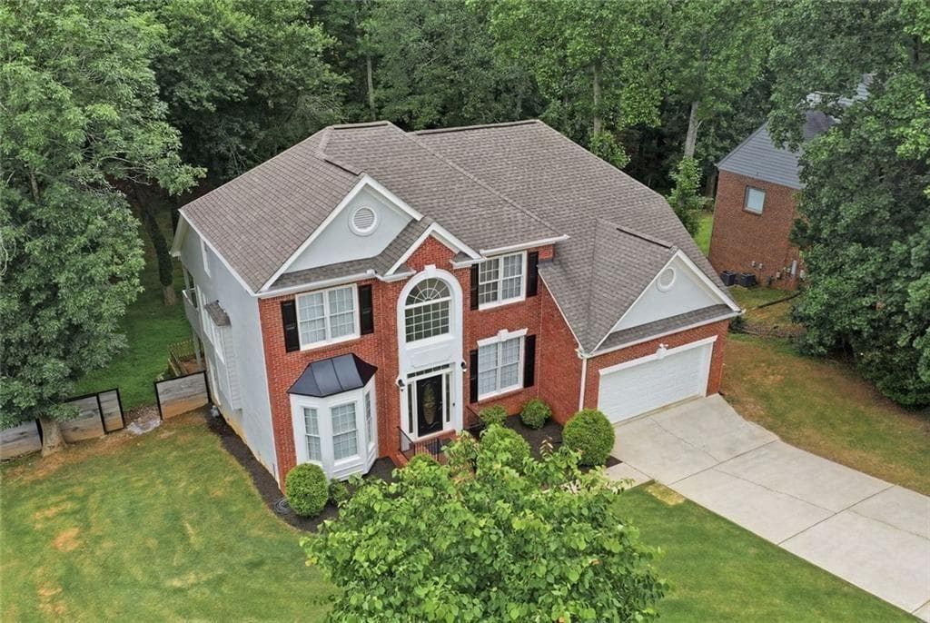 6 bedroom, 4 bathroom, 5,070 sq ft single family residence for sale at 6353 Chestnut Parkway, Flowery Branch, GA 30542 — photo 3