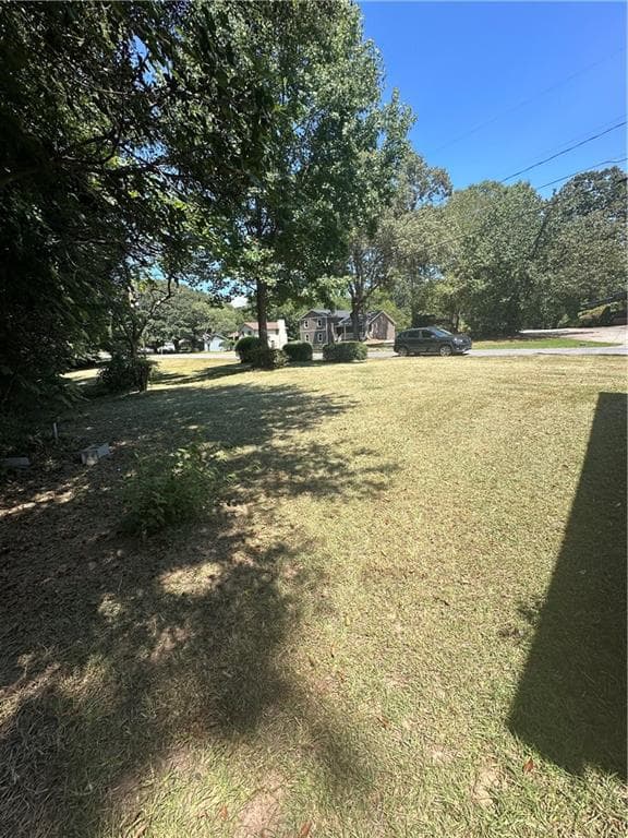 3 bedroom, 2 bathroom, 1,291 sq ft single family residence for sale at 600 E Lanier Avenue, Fayetteville, GA 30214 — photo 2