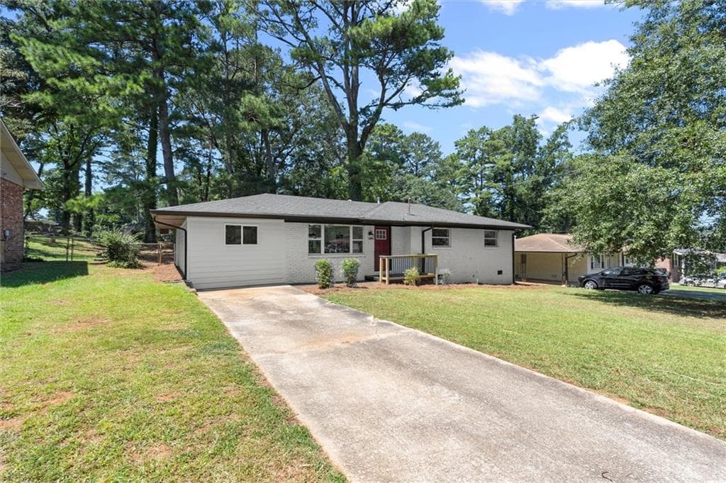 4 bedroom, 3 bathroom, 1,550 sq ft single family residence for sale at 1933 Glen Echo Drive, Decatur, GA 30032 — photo 2