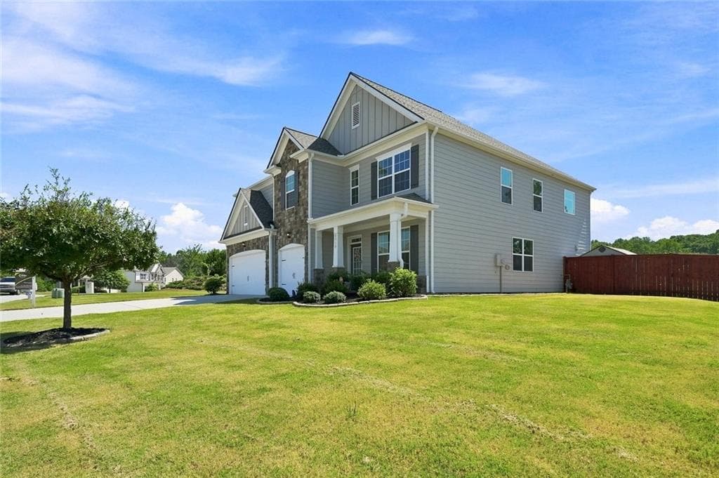 5 bedroom, 4 bathroom, 3,603 sq ft single family residence for sale at 6715 Rambling Vale, Cumming, GA 30028 — photo 3