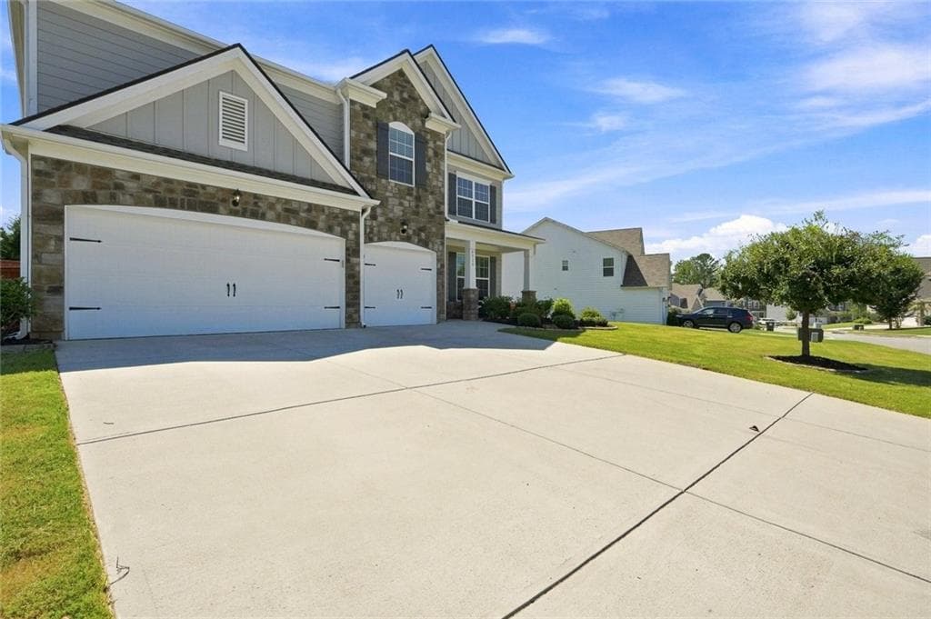 5 bedroom, 4 bathroom, 3,603 sq ft single family residence for sale at 6715 Rambling Vale, Cumming, GA 30028 — photo 4