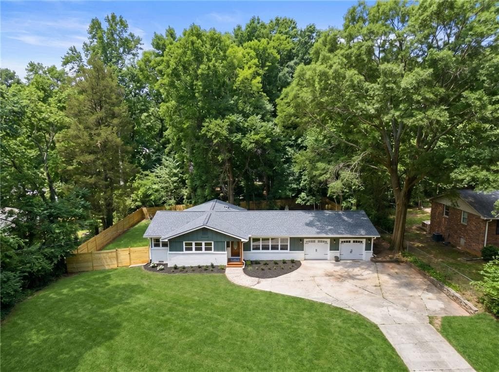 4 bedroom, 3 bathroom, 1,862 sq ft single family residence for sale at 3000 Henderson Mill Road, Atlanta, GA 30341 — photo 5