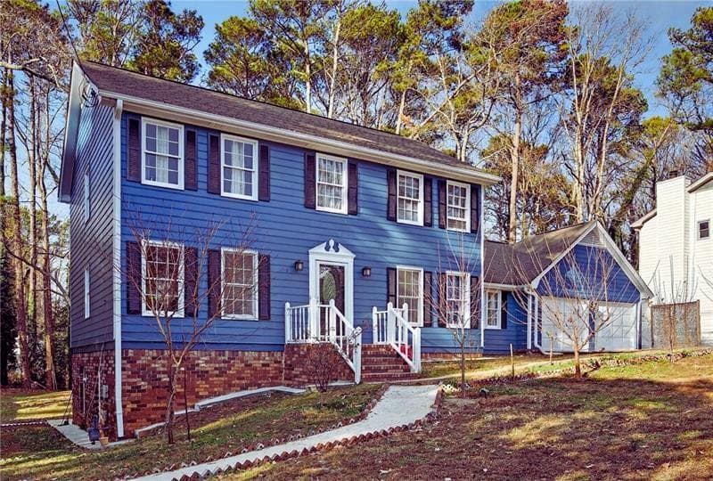 5 bedroom, 3 bathroom, 3,237 sq ft single family residence for sale at 4673 Arrowhead Trail, Lilburn, GA 30047 — photo 2