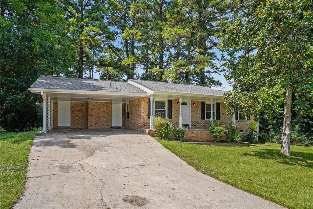 3 bedroom, 2 bathroom, 1,136 sq ft single family residence for sale at 5893 Ronnie Drive, Rex, GA 30273 — photo 2