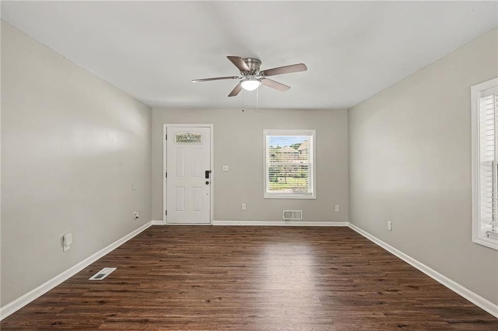 3 bedroom, 2 bathroom, 1,136 sq ft single family residence for sale at 5893 Ronnie Drive, Rex, GA 30273 — photo 3