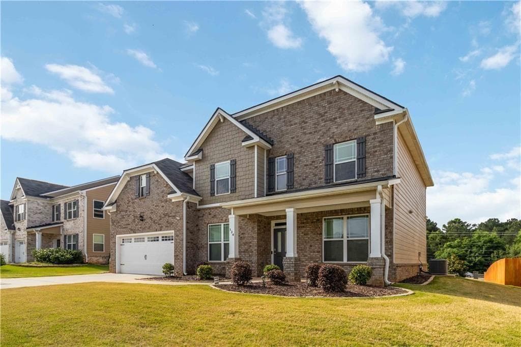 5 bedroom, 3 bathroom, 3,034 sq ft single family residence for sale at 324 Conley Avenue, Hampton, GA 30228 — photo 4