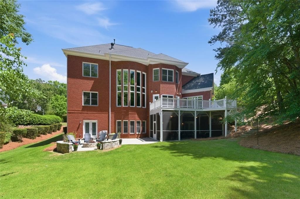 6 bedroom, 5 bathroom, 6,865 sq ft single family residence for sale at 348 Aviemore Lane, Suwanee, GA 30024 — photo 2