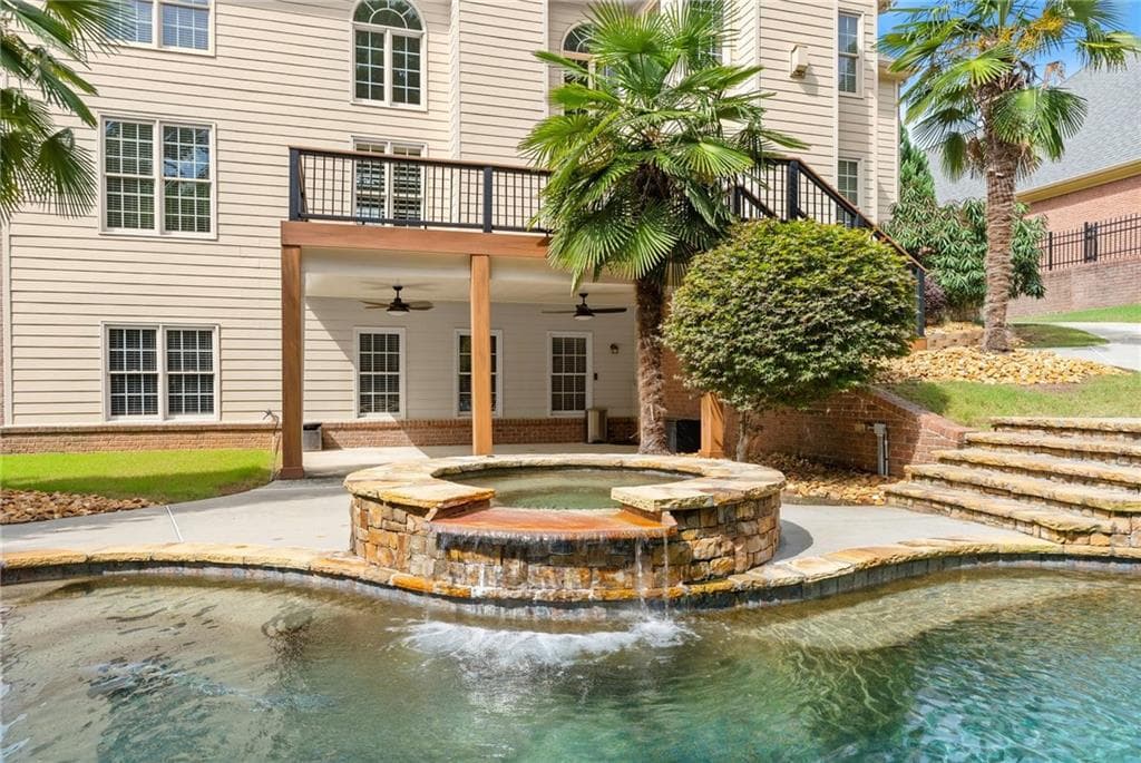 6 bedroom, 6 bathroom, 6,184 sq ft single family residence for sale at 3960 Bonnett Creek Lane, Hoschton, GA 30548 — photo 5
