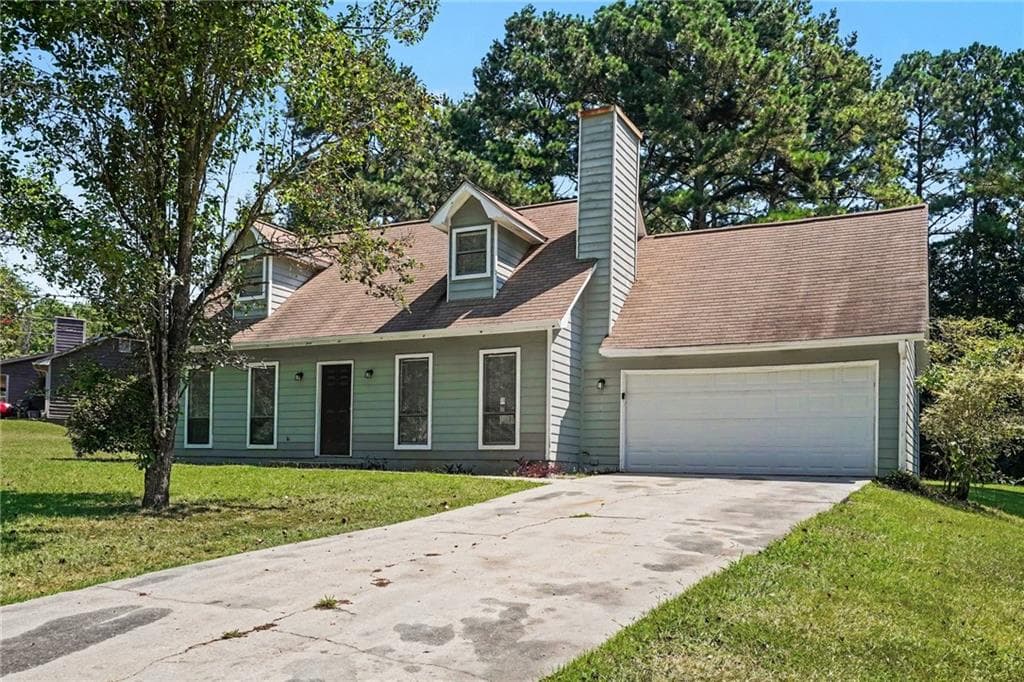 3 bedroom, 2 bathroom, 1,450 sq ft single family residence for sale at 9042 Chestnut Lake Drive, Jonesboro, GA 30236 — photo 2
