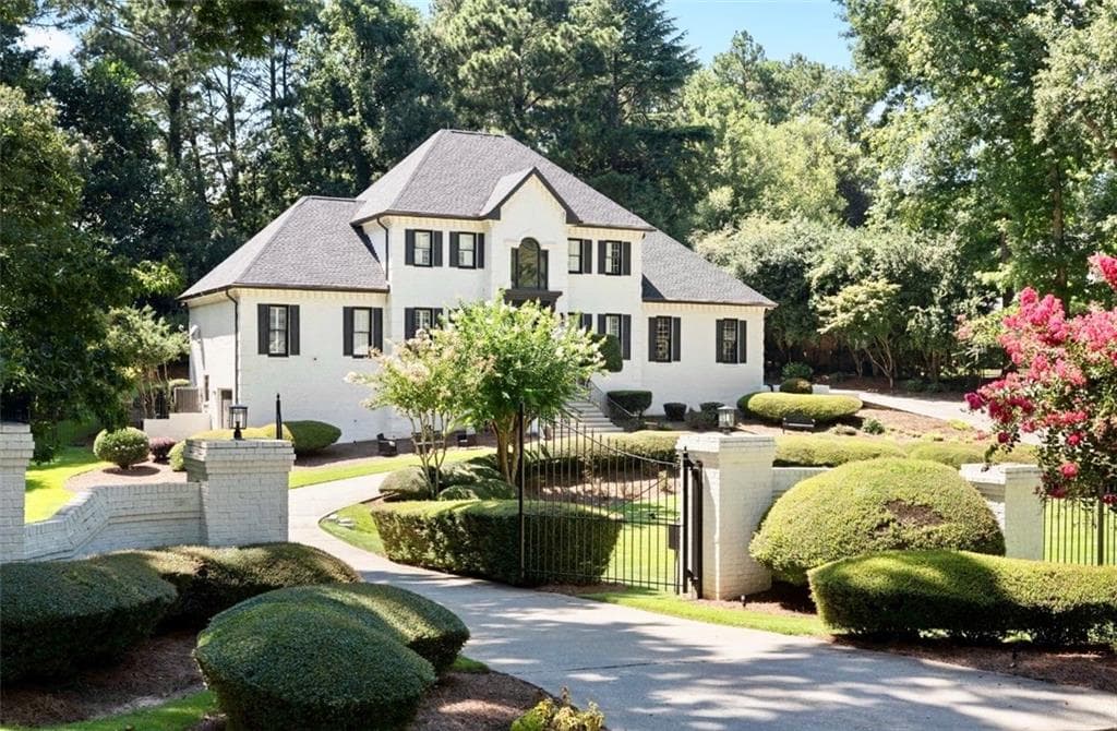 5 bedroom, 5 bathroom, 5,538 sq ft single family residence for sale at 4576 Ridgegate Drive, Peachtree Corners, GA 30097 — photo 1 of 75