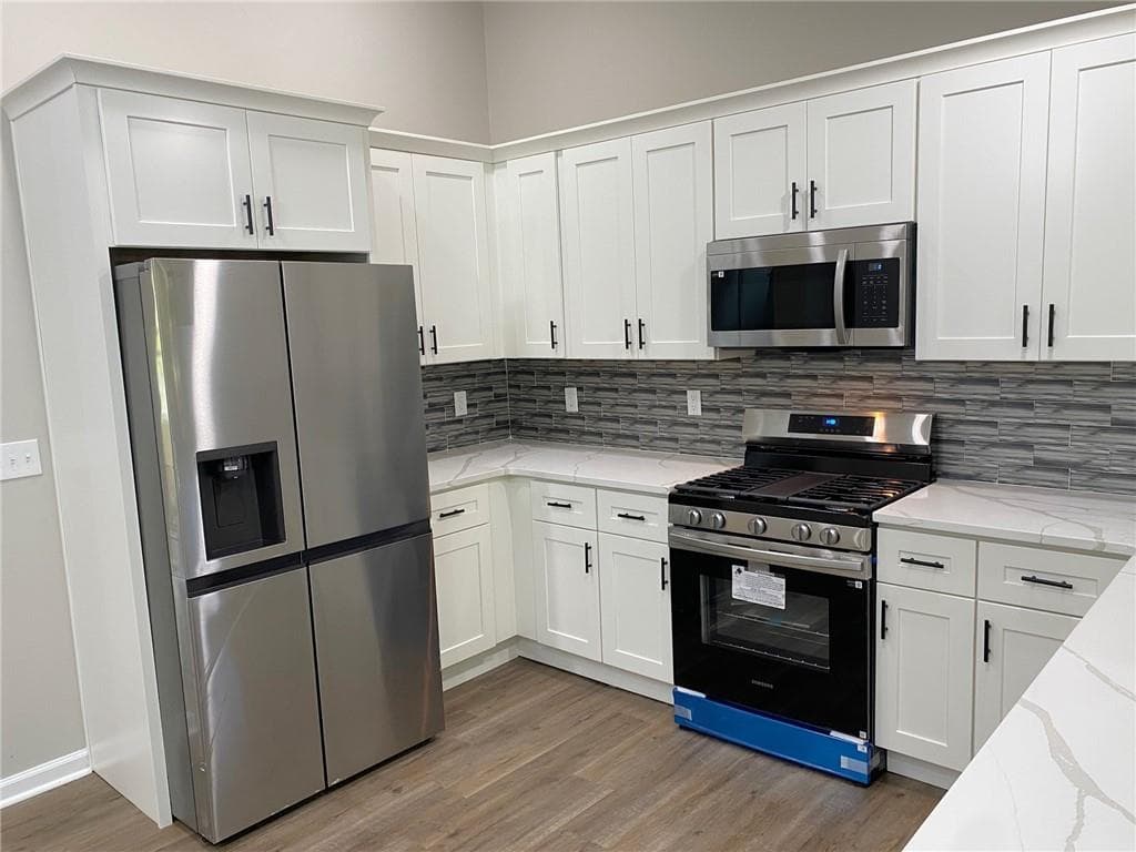 5 bedroom, 3 bathroom, 2,188 sq ft single family residence for sale at 1413 Silver Lake Drive, Norcross, GA 30093 — photo 4