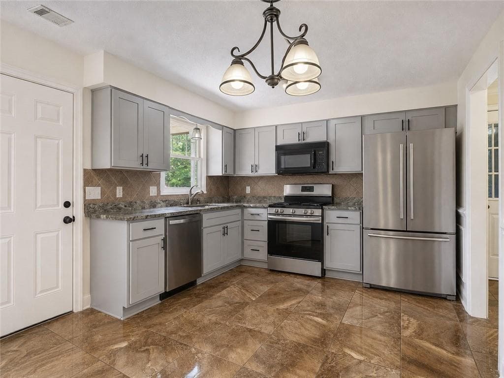4 bedroom, 3 bathroom, 1,568 sq ft single family residence for sale at 2856 Nuptial Lane, Lawrenceville, GA 30044 — photo 6