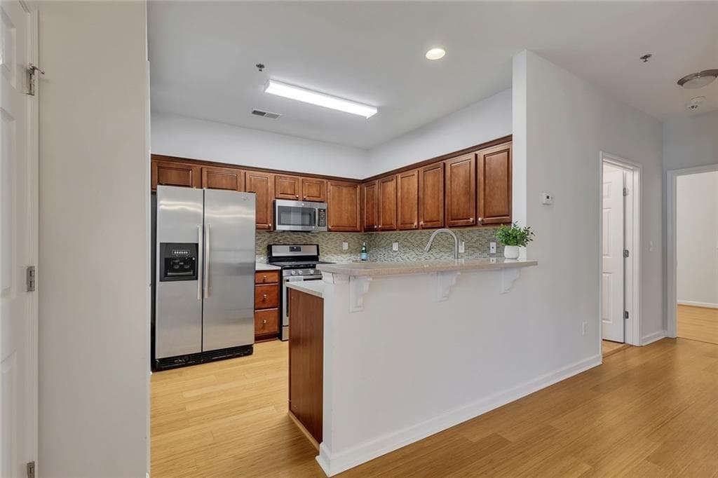 2 bedroom, 2 bathroom, 1,597 sq ft condominium under contract at 242 Riverstone Place, Canton, GA 30114 — photo 10