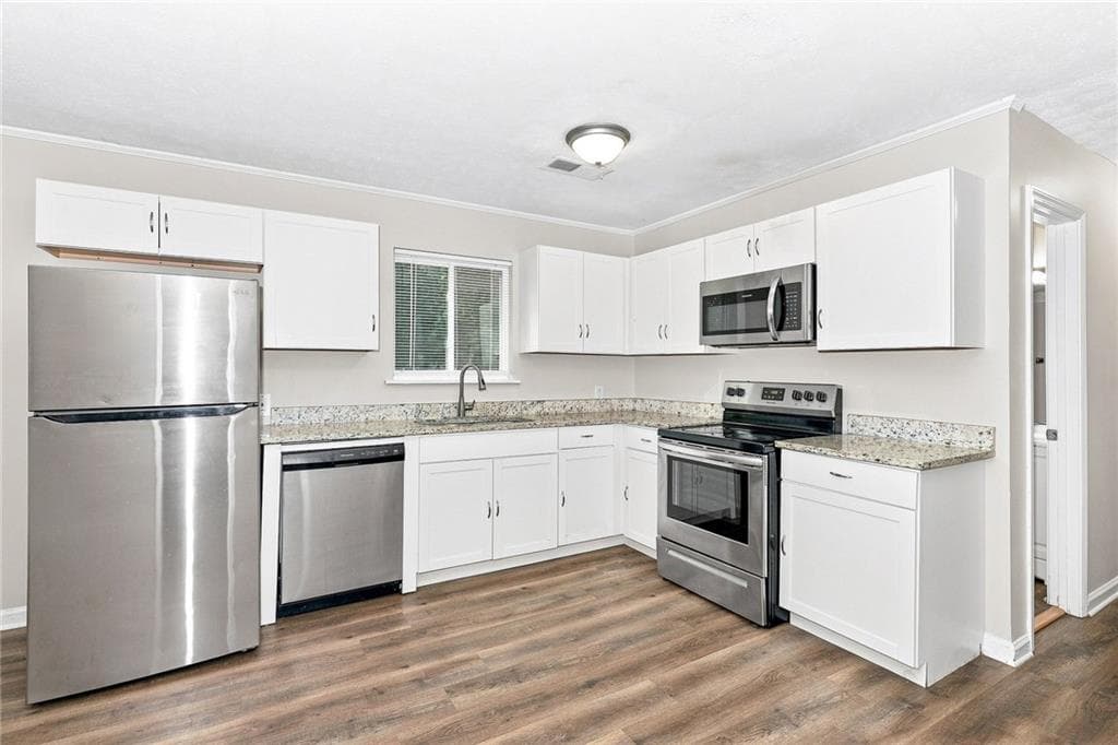 3 bedroom, 2 bathroom, 1,425 sq ft single family residence for rent at 8788 E Bourne Drive, Jonesboro, GA 30238 for $1,515 a month — photo 2