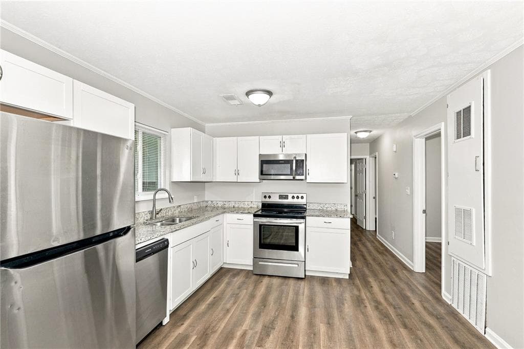3 bedroom, 2 bathroom, 1,425 sq ft single family residence for rent at 8788 E Bourne Drive, Jonesboro, GA 30238 for $1,515 a month — photo 3