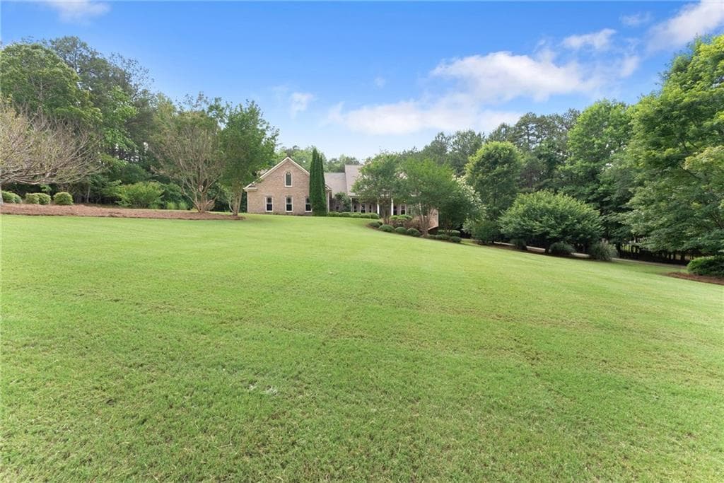 5 bedroom, 4 bathroom, 4,944 sq ft single family residence for sale at 1178 Antrim Glen Drive, Hoschton, GA 30548 — photo 2