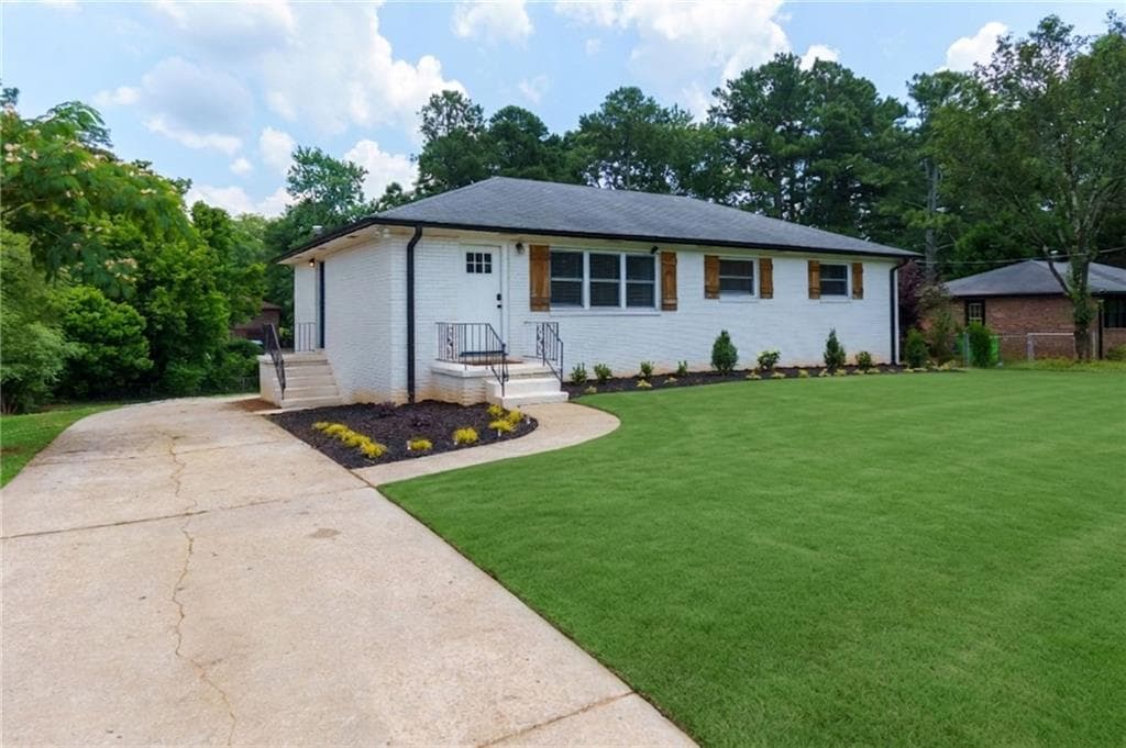 3 bedroom, 2 bathroom, 1,296 sq ft single family residence for sale at 2653 Hicks Road, Marietta, GA 30060 — photo 2