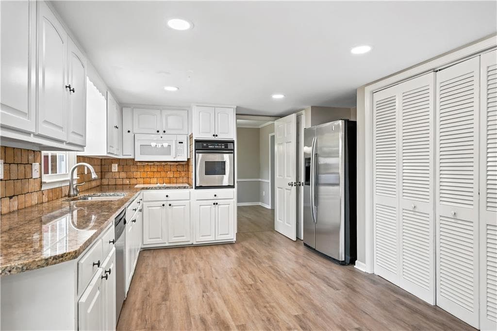 4 bedroom, 3 bathroom, 2,078 sq ft single family residence under contract at 1741 Beauregard Drive, Lilburn, GA 30047 — photo 2