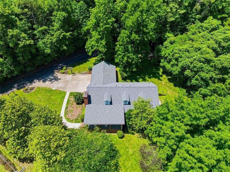 6 bedroom, 6 bathroom, 5,585 sq ft single family residence for sale at 1511 Sandy Bottom Road, Tate, GA 30177 — photo 2