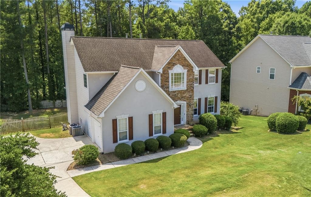 4 bedroom, 3 bathroom, 2,918 sq ft single family residence for sale at 110 S Links Drive, Covington, GA 30014 — photo 2