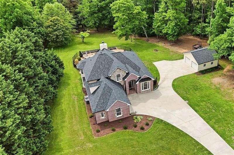 5 bedroom, 4 bathroom, 4,988 sq ft single family residence for sale at 2235 Lower Burris Road, Canton, GA 30114 — photo 4