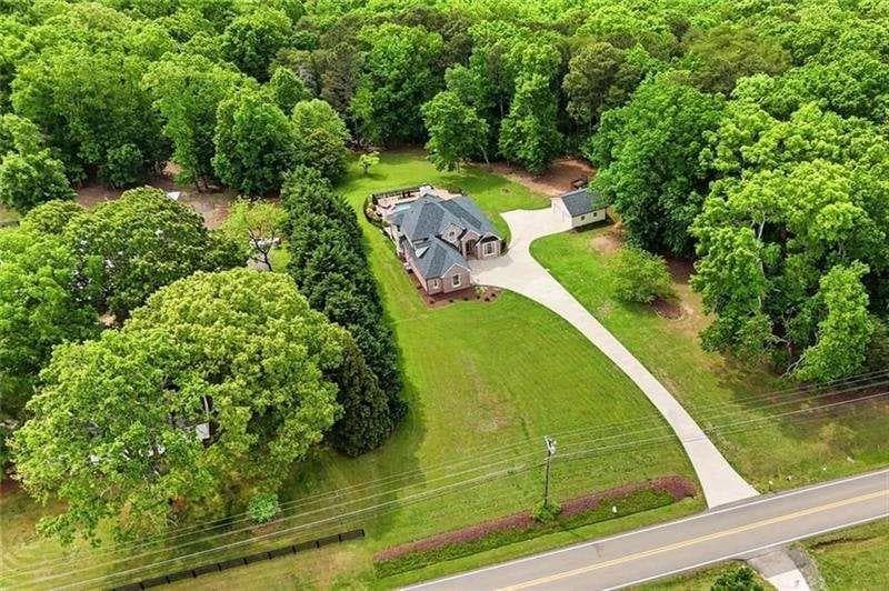 5 bedroom, 4 bathroom, 4,988 sq ft single family residence for sale at 2235 Lower Burris Road, Canton, GA 30114