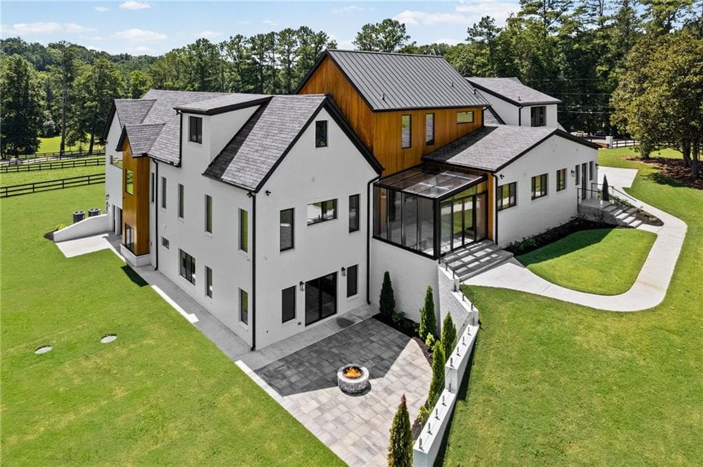 5 bedroom, 7 bathroom, 8,495 sq ft single family residence for sale at 14735 Wood Road, Milton, GA 30004