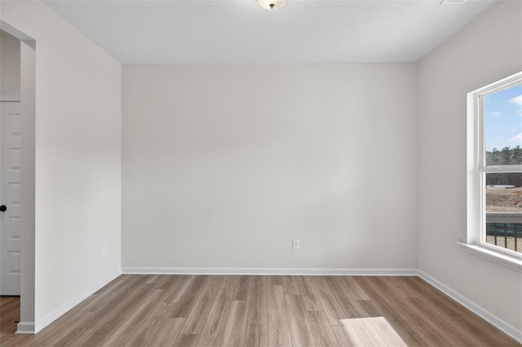 4 bedroom, 3 bathroom, 2,565 sq ft single family residence for sale at 550 Grover Street, Hoschton, GA 30548 — photo 3